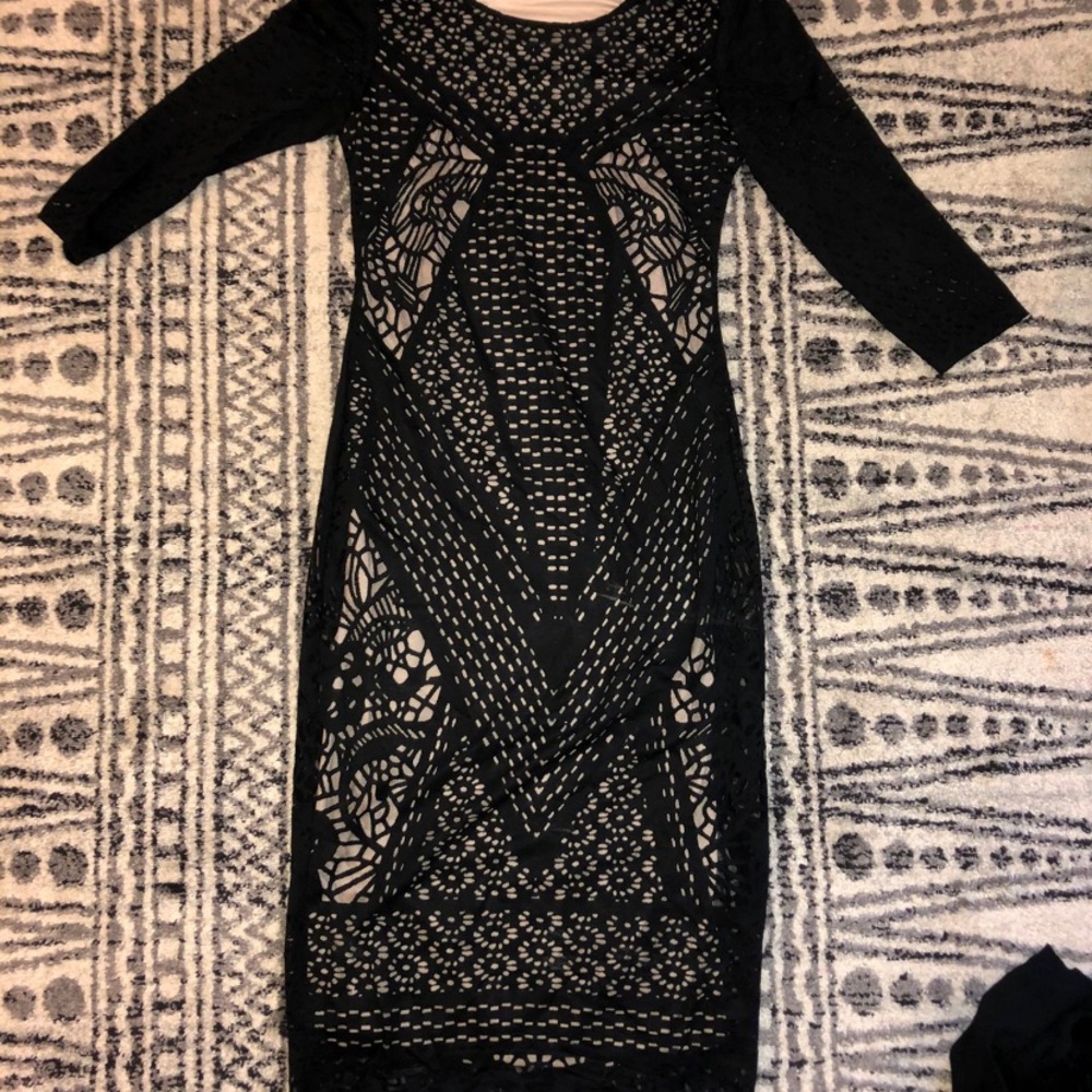 Carmen Marc’s bodycon dress
